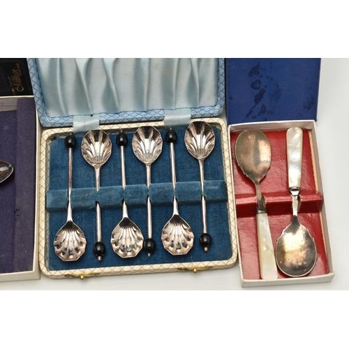 21 - A BOX OF ASSORTED WHITE METAL WARE, to include four trays, cased sets of spoons, a pair of candle st... 