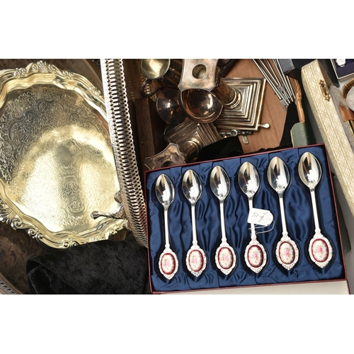 21 - A BOX OF ASSORTED WHITE METAL WARE, to include four trays, cased sets of spoons, a pair of candle st... 