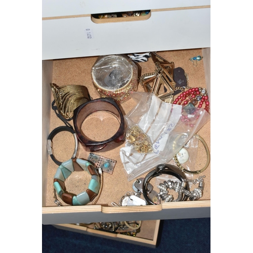 26 - TWO SETS OF STORAGE UNITS WITH A LARGE ASSORTMENT OF COSTUME JEWELLERY, each unit with six drawers c... 