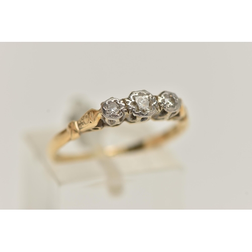 31 - A THREE STONE DIAMOND RING, a principle round brilliant cut diamond with two single cut diamonds, pr... 