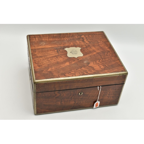 7 - A VICTORIAN FIGURED WALNUT AND PLATED METAL BOUND TOILET BOX, the hinged lid with shield cartouche e... 