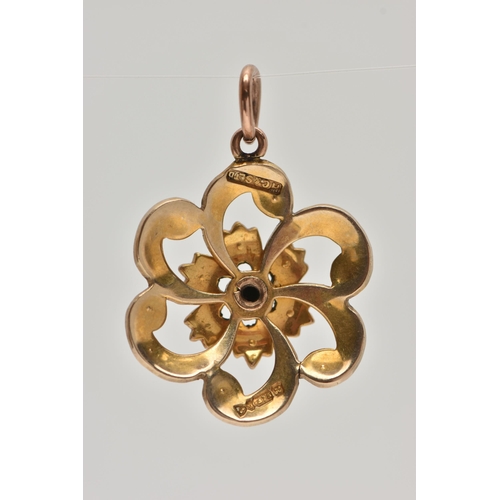 44 - A EARLY 20TH CENTURY 9CT GOLD PENDANT, a yellow gold floral open work pendant, set with seed pearls,... 