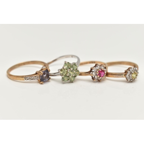 53 - FOUR GEM SET RINGS, the first a yellow gold cluster ring set with a stone assessed as sphene and dia... 