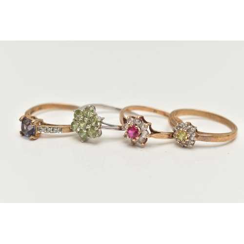 53 - FOUR GEM SET RINGS, the first a yellow gold cluster ring set with a stone assessed as sphene and dia... 