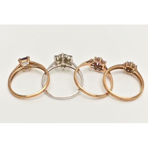 53 - FOUR GEM SET RINGS, the first a yellow gold cluster ring set with a stone assessed as sphene and dia... 