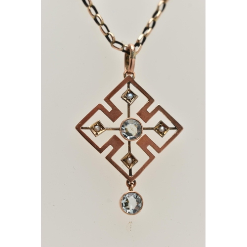 59 - AN EARLY 20TH CENTURY ART DECO PENDANT, a rose gold quatrefoil open work pendant, principally set wi... 