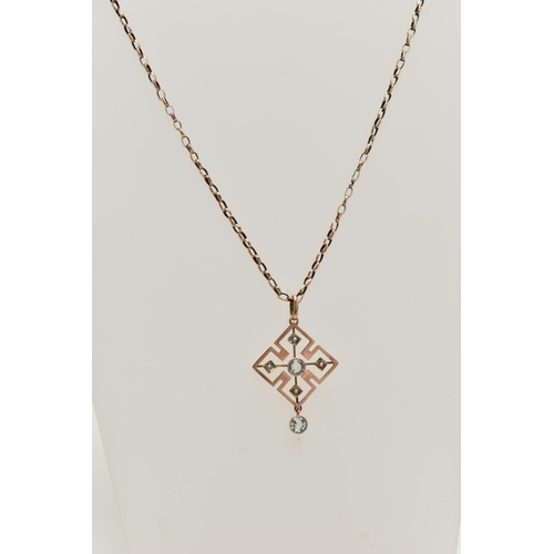 59 - AN EARLY 20TH CENTURY ART DECO PENDANT, a rose gold quatrefoil open work pendant, principally set wi... 