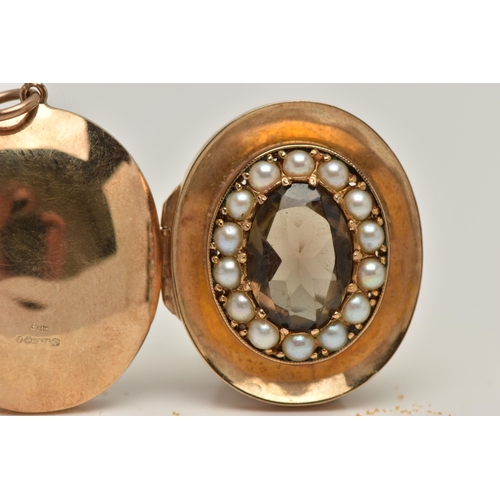 61 - A 9CT GOLD SMOKY QUARTZ AND SPLIT PEARL LOCKET, concaved locket principally set with an oval cut smo... 