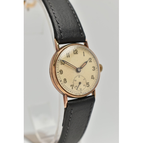 67 - A 9CT GOLD WRISTWATCH, hand wound movement, round dial, Arabic numerals, second subsidiary dial at t... 