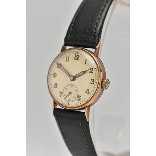 67 - A 9CT GOLD WRISTWATCH, hand wound movement, round dial, Arabic numerals, second subsidiary dial at t... 