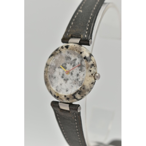 68 - A 'TISSOT' ROCKWATCH, quartz movement, round dial signed 'Tissot', hardstone case, approximate case ... 