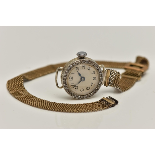 84 - AN EARLY 20TH CENTURY LADYS 18CT GOLD AND DIAMOND WRISTWATCH, manual wind, round white dial, Arabic ... 