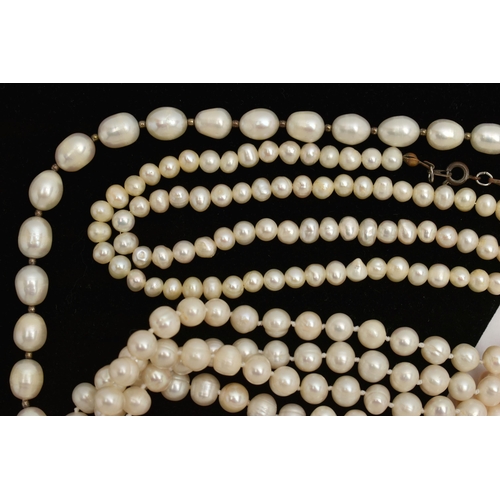 86 - AN ASSORTMENT OF CULTURED PEARL NECKLACES, to include a single row of individually knotted cream pea... 