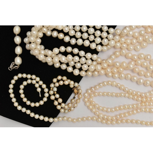 86 - AN ASSORTMENT OF CULTURED PEARL NECKLACES, to include a single row of individually knotted cream pea... 