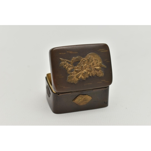 103 - A JAPANESE MEIJI PERIOD BRONZED AND GILT METAL PILL BOX, gilt relief decoration to top and sides, hi... 