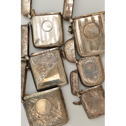 111 - SIX EDWARDIAN AND GEORGE V SILVER RECTANGULAR VESTA CASES, two engine turned and four foliate engrav... 