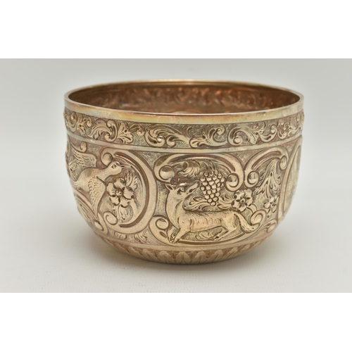 116 - A MID 20TH CENTURY SILVER EMBOSSED BOWL, embossed floral and foliage pattern with vacant cartouche, ... 