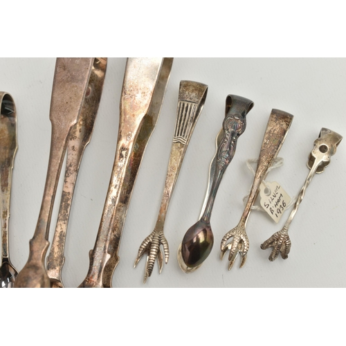 129 - TEN PAIRS OF SUGAR TONGS, to include two large sized fiddle pattern tongs, and eight smaller tongs o... 