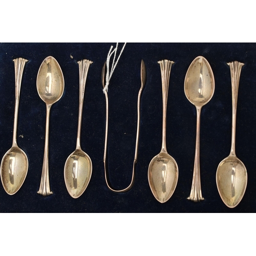 138 - THREE CASED SETS OF SILVER COFFEE SPOONS, comprising an Elizabeth II set in a semi-circular case, Bi... 