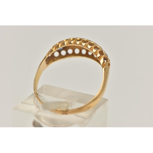 94 - AN EARLY 20TH CENTURY 18CT GOLD BOAT RING, set with three circular cut blue sapphires interspaced wi... 