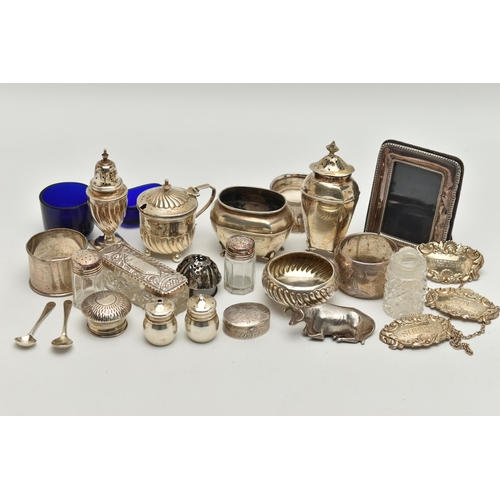 150 - AN ASSORTED BOX OF SILVER ITEMS, to include three napkin rings, salt and pepper shakers, three decan... 