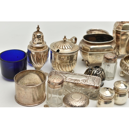 150 - AN ASSORTED BOX OF SILVER ITEMS, to include three napkin rings, salt and pepper shakers, three decan... 