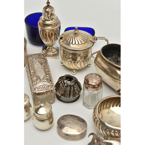 150 - AN ASSORTED BOX OF SILVER ITEMS, to include three napkin rings, salt and pepper shakers, three decan... 