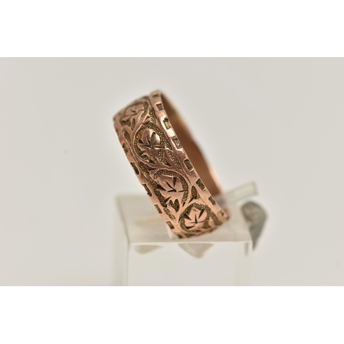 152 - A 9CT GOLD BAND RING, wide rose gold band, etched with foliage detail, approximate width 7.5mm, hall... 