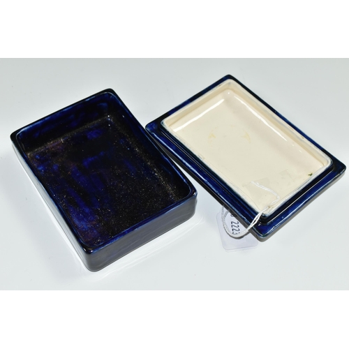 347 - A MOORCROFT POTTERY RECTANGULAR LIDDED TRINKET BOX, 'Anemone' pattern on a dark blue ground, paper Q... 