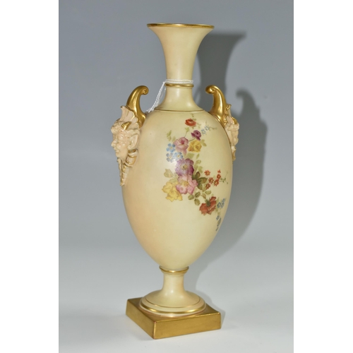 348 - A ROYAL WORCESTER VASE WITH MASK BOSS HANDLES, a collared flared neck vase in a blush ivory ground w... 