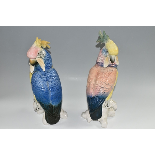 364 - TWO KARL ENS PORCELAIN COCKATOOS, each modelled perched on a branch, and glazed in pastel pinks, blu... 