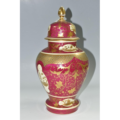 365 - A VIENNA STYLE COVERED VASE, printed and tinted with three figures in a landscape on a cerise gilt g... 