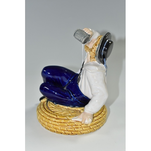 367 - A MAJOLICA FIGURE OF A SEATED SAILOR DRINKING FROM A TANKARD, IN THE STYLE OF MINTON, unmarked, heig... 