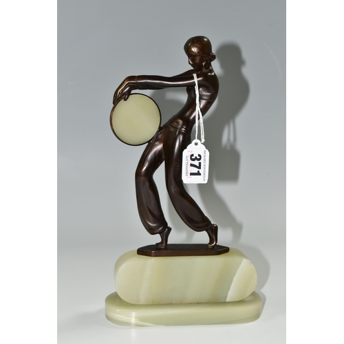 371 - AFTER LORENZL, an Art Deco style bronze figure of a tambourine dancer, on a green onyx base, height ... 