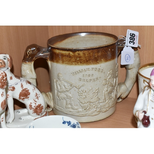 386 - A WORCESTER PORCELAIN BLUE AND WHITE TEA BOWL AND SAUCER DECORATED IN THE PRUNUS ROOT PATTERN, paint... 