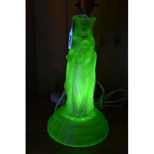 388 - AN ART DECO THREE GRACES URANIUM GLASS TABLE LAMP, TWO CEILING LIGHT FITTINGS AND A TIFFANY STYLE SH... 