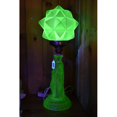 388 - AN ART DECO THREE GRACES URANIUM GLASS TABLE LAMP, TWO CEILING LIGHT FITTINGS AND A TIFFANY STYLE SH... 