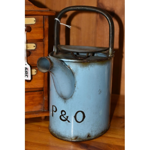 389 - A SMALL SPICE CABINET AND A BLUE ENAMEL HOT WATER POT, comprising a seven drawer spice cabinet, six ... 