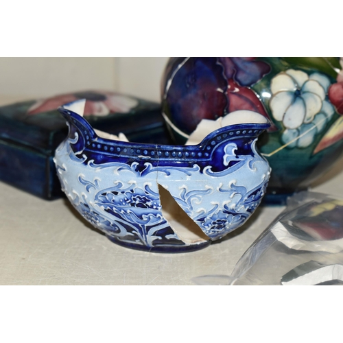 402 - TWO PIECES OF MOORCROFT POTTERY AND A MACINTYRE SUGAR BOWL, all in very poor condition, the Moorcrof... 