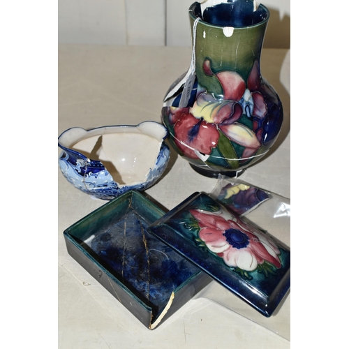 402 - TWO PIECES OF MOORCROFT POTTERY AND A MACINTYRE SUGAR BOWL, all in very poor condition, the Moorcrof... 