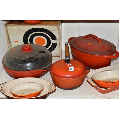 404 - A GROUP OF CAST IRON AND STONEWARE COOKWARE, thirteen pieces to include boxed Le Creuset and other F... 