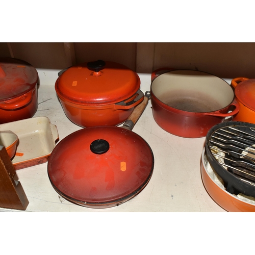 404 - A GROUP OF CAST IRON AND STONEWARE COOKWARE, thirteen pieces to include boxed Le Creuset and other F... 