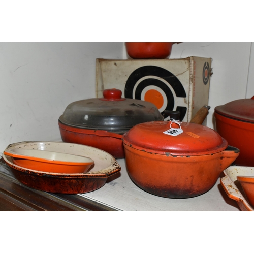 404 - A GROUP OF CAST IRON AND STONEWARE COOKWARE, thirteen pieces to include boxed Le Creuset and other F... 