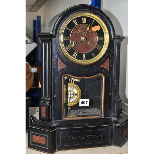 407 - A VICTORIAN FRENCH SLATE MANTEL CLOCK, with red marble inlay, black enamel dial, gilt Roman numerals... 