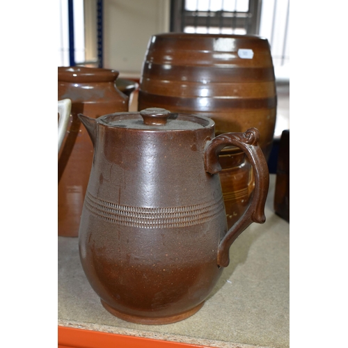 409 - A COLLECTION OF EARTHENWARE SALTGLAZED POTS, comprising a beer keg, two large jars, two twin handled... 