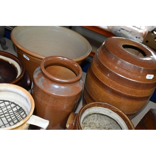 409 - A COLLECTION OF EARTHENWARE SALTGLAZED POTS, comprising a beer keg, two large jars, two twin handled... 