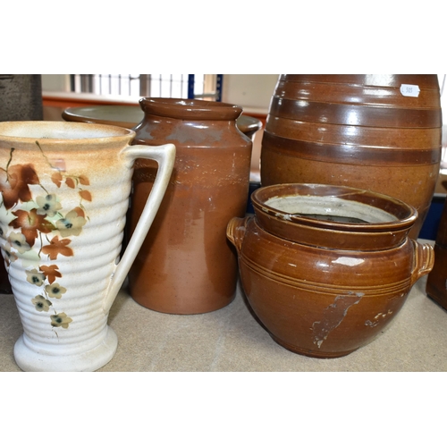 409 - A COLLECTION OF EARTHENWARE SALTGLAZED POTS, comprising a beer keg, two large jars, two twin handled... 