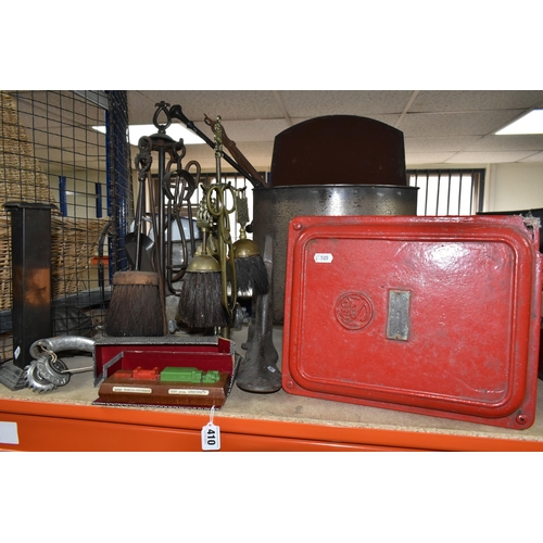 410 - A GROUP OF METALWARE, comprising three fireside companion sets, a metal coal box, a model 300mw turb... 