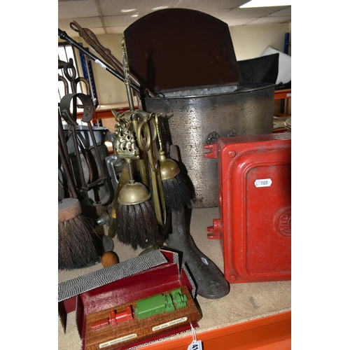 410 - A GROUP OF METALWARE, comprising three fireside companion sets, a metal coal box, a model 300mw turb... 