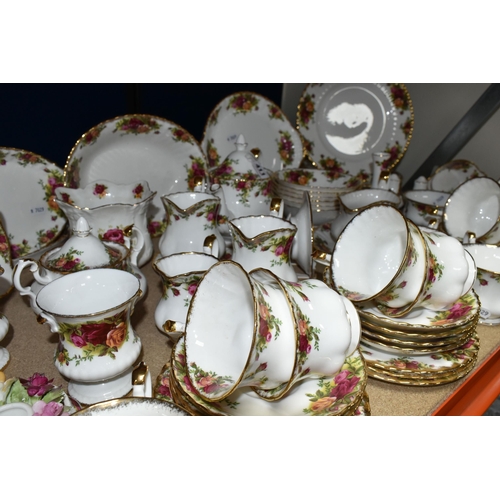 411 - A QUANTITY OF ROYAL ALBERT 'OLD COUNTRY ROSES' PATTERN DINNER AND TEAWARE, comprising six dinner pla... 